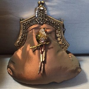 New Iridescent satin bag with crystal bird pin.